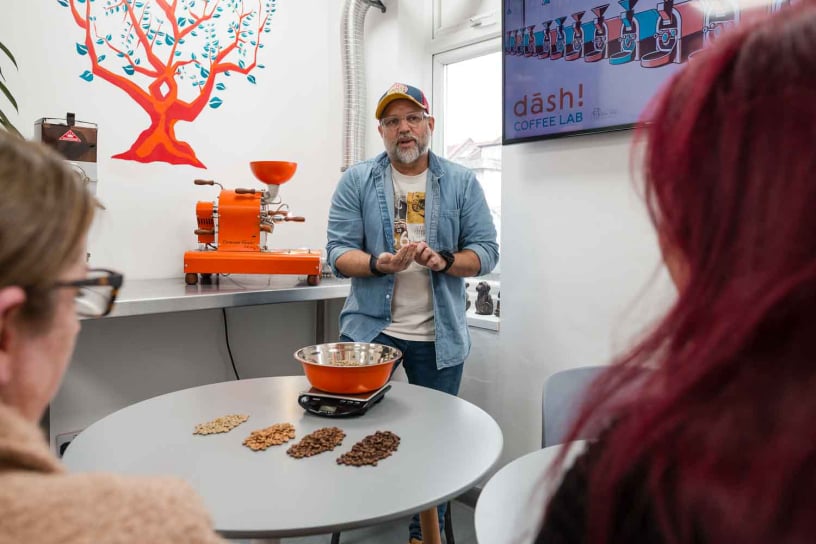 Hands-on coffee roasting process – selecting green beans, monitoring roast profiles, and achieving the perfect roast.