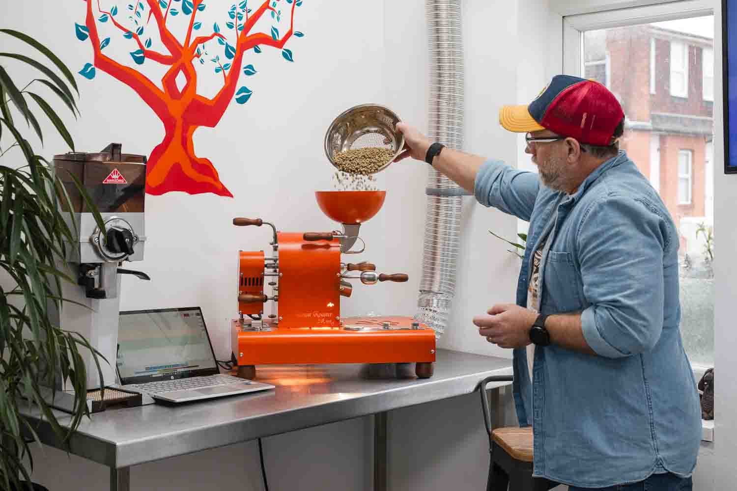 Hands-on coffee roasting process – selecting green beans, monitoring roast profiles, and achieving the perfect roast.