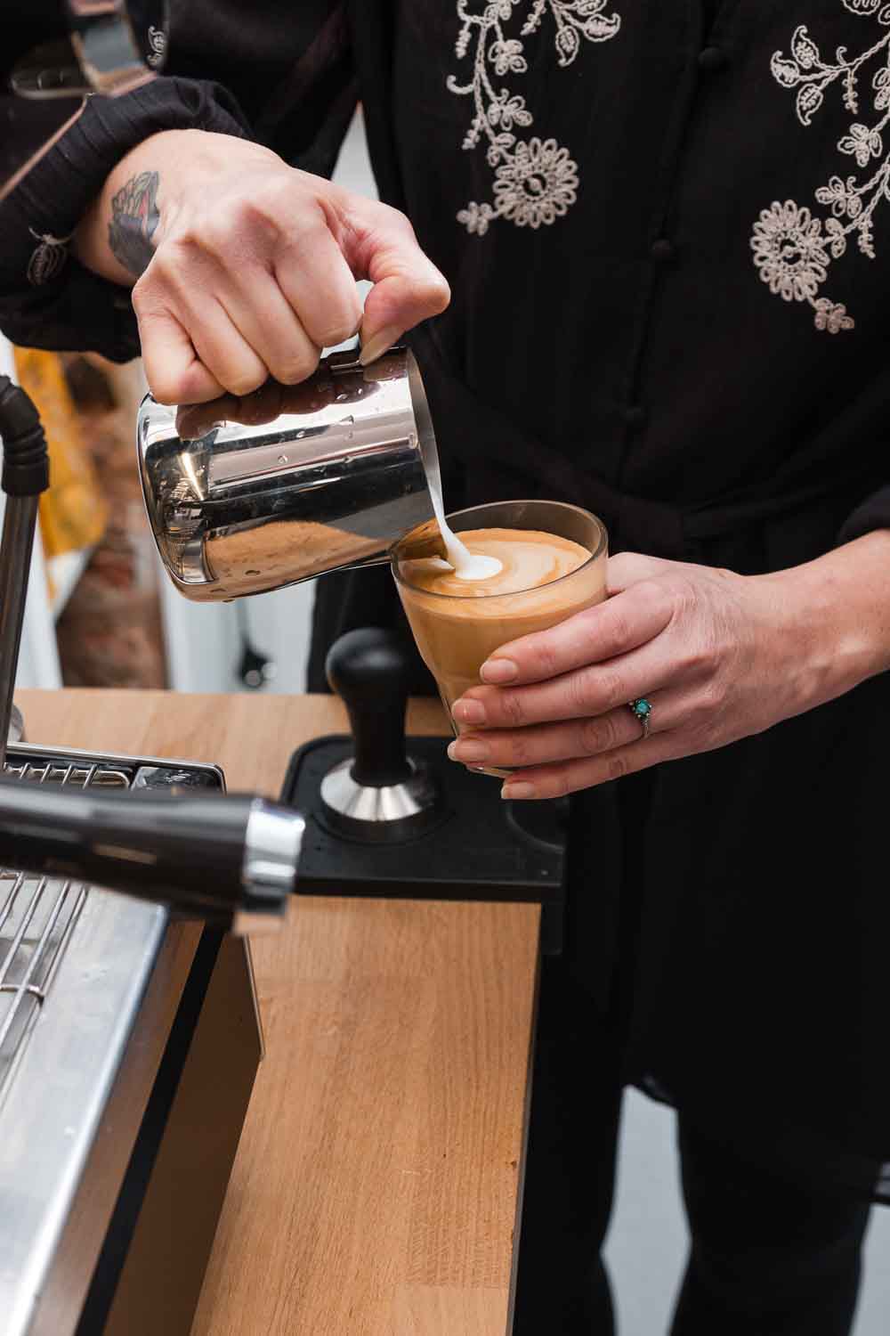 Barista training: hands-on learning and coffee craftsmanship in action.