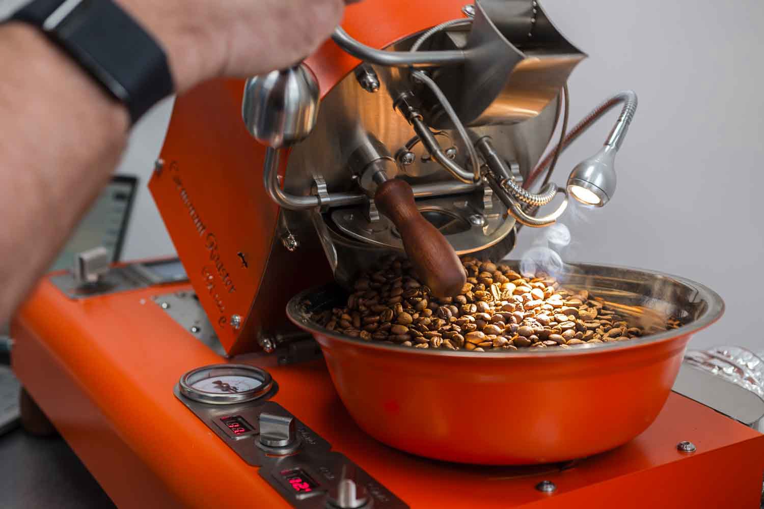 Hands-on coffee roasting process – selecting green beans, monitoring roast profiles, and achieving the perfect roast.