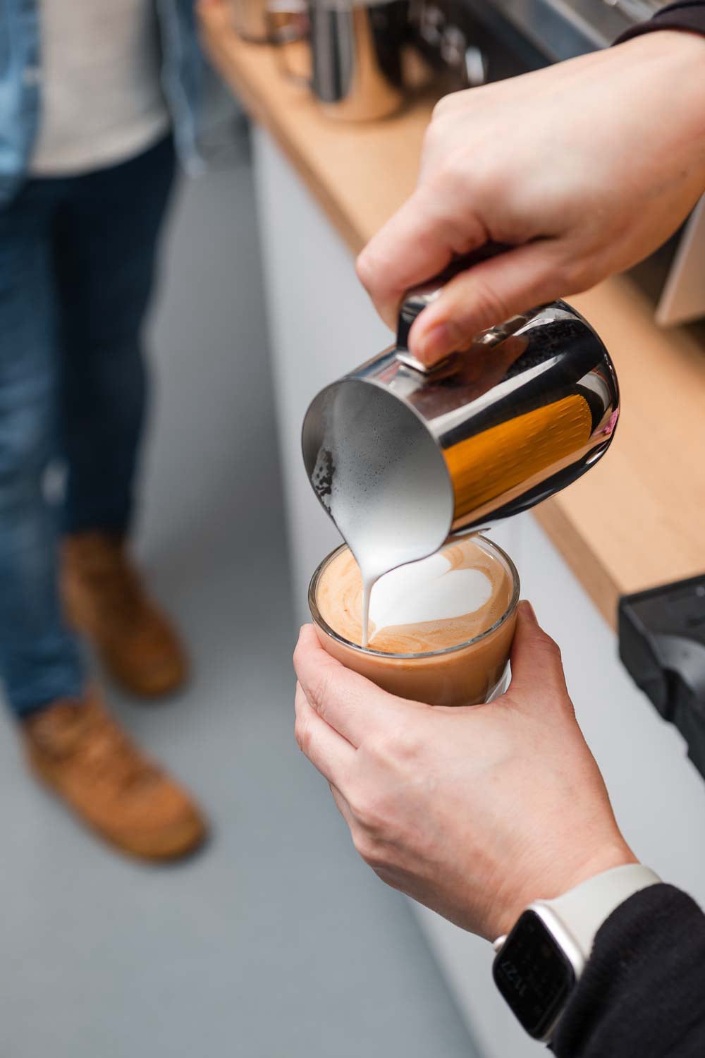 Barista training: hands-on learning and coffee craftsmanship in action.