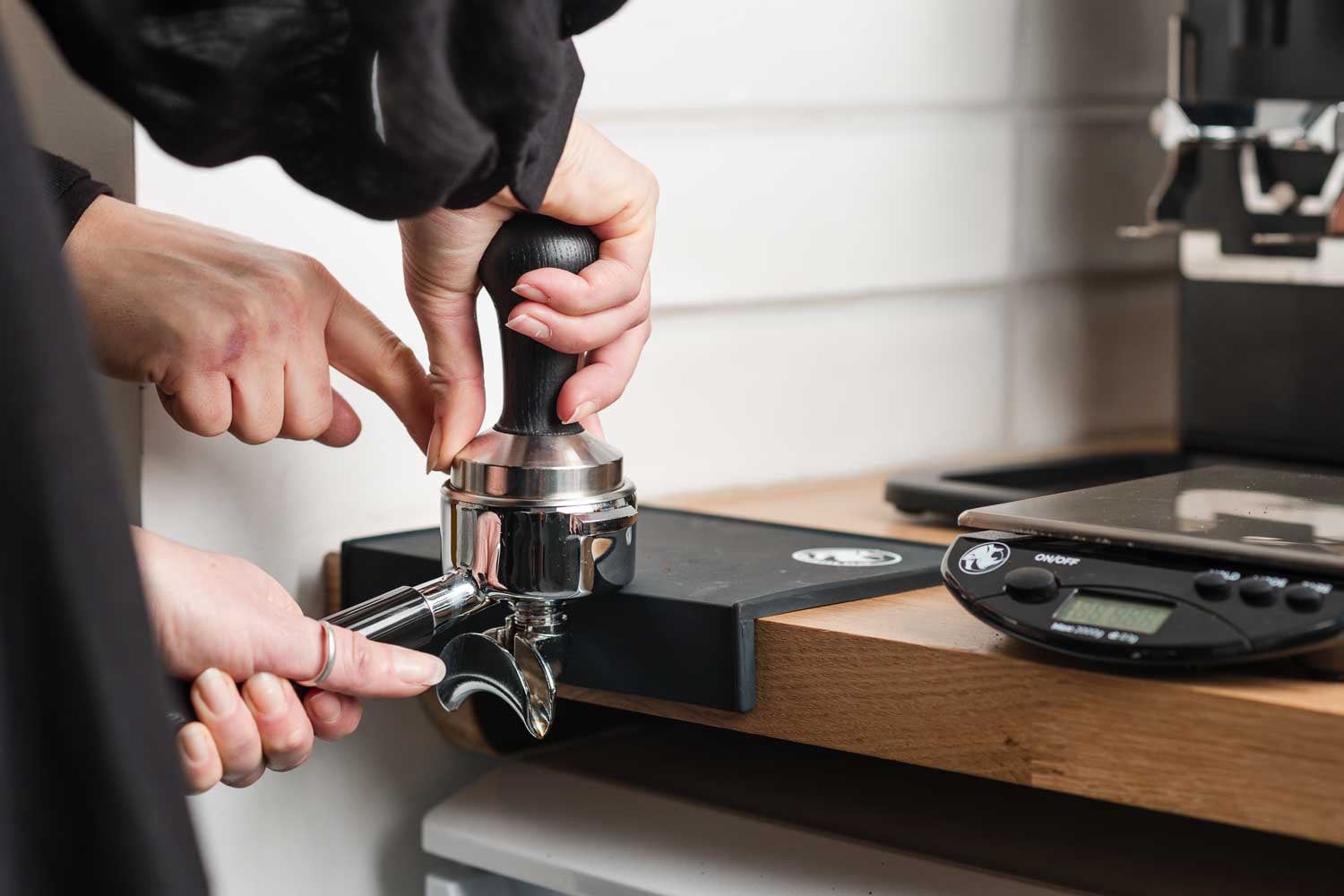 Barista training: hands-on learning and coffee craftsmanship in action.